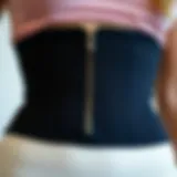 Close-up view of a waist trainer with intricate zipper detailing