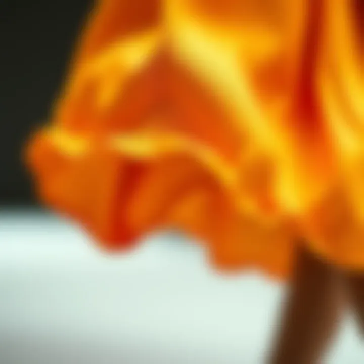 Close-up of a dolphin hem detail on a flowing garment