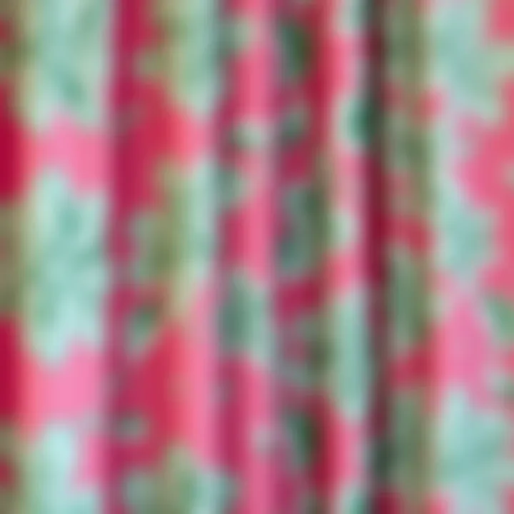 Close-up of intricate floral patterns on a pink and green shower curtain