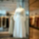 Elegant white plus size dress on a mannequin in a boutique setting