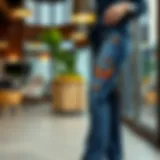 Elegant butterfly print straight leg jeans showcased in a stylish setting