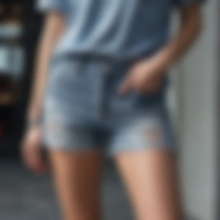 Trendy frayed hem jean shorts paired with chic streetwear