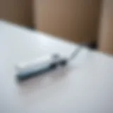 Compact mini wireless straightener on a sleek surface