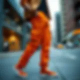 Urban Chic Orange Cargo Trousers Vibrant orange cargo trousers showcased in an urban setting