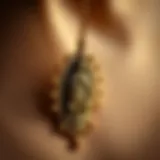 A close-up view of a Virgin Mary necklace with intricate detailing