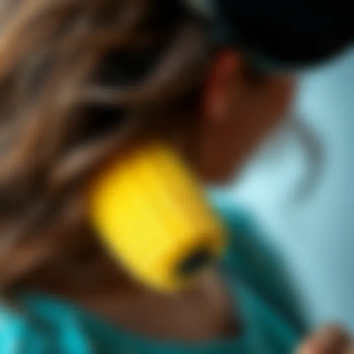 Close-up of a sponge curler in action on hair.