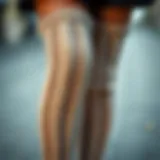 A close-up view of luxurious thigh-high leg warmers made from soft yarn.