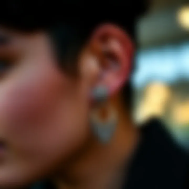Close-up of tragus earrings enhancing personal style