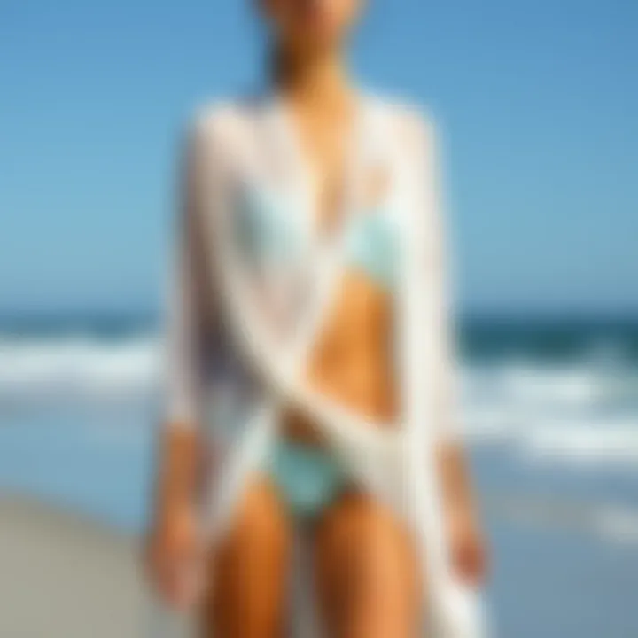 Elegant beach cover-up draping over a two-piece bathing suit
