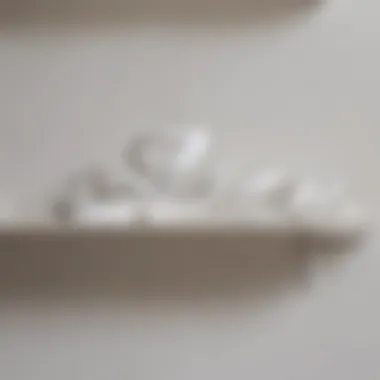 Variety of white flat sandals displayed on a shelf