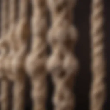 Close-up of wooden beads being incorporated into macrame knots.