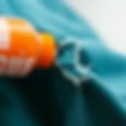 Close-up of fabric mending glue application on a torn garment