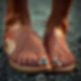 A close-up of intricate fishnet sandal patterns displaying craftsmanship