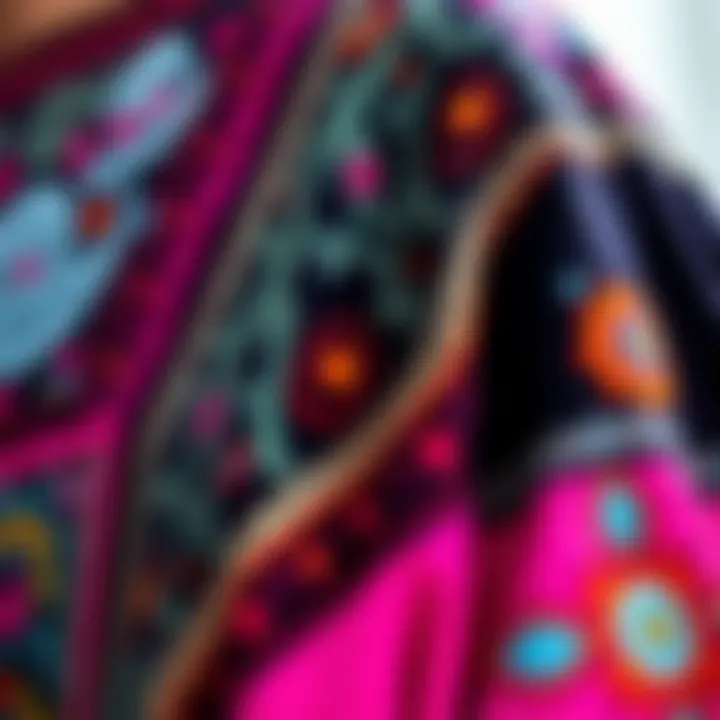 Close-up of a garment showcasing intricate designs and vibrant colors from the collection
