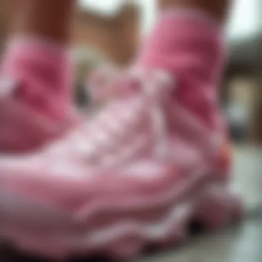Close-up of unique design elements of pink sock sneakers