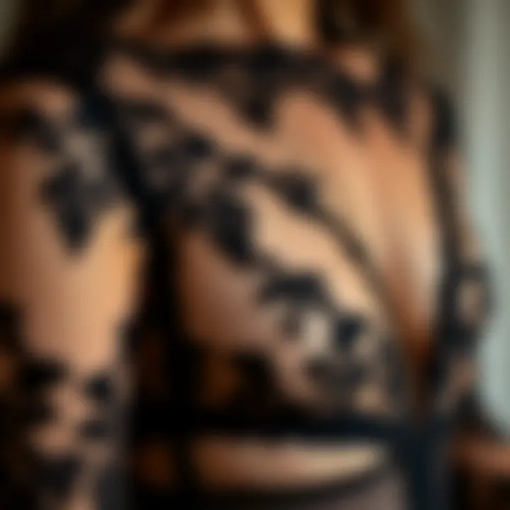 Close-up of intricate lacework on long sleeve black lingerie