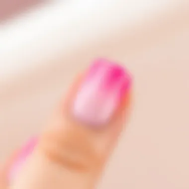 Polished Pink Ombre Nail Design Close-up of a polished ombre nail design
