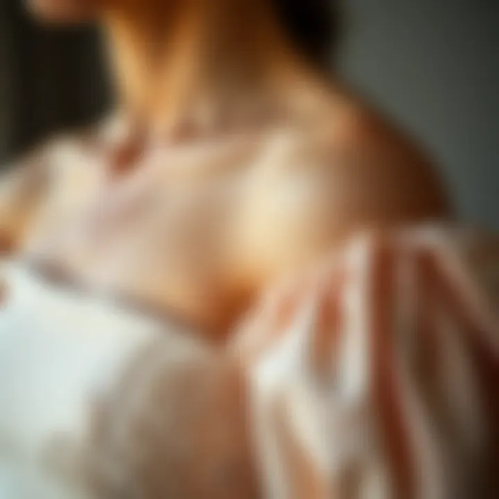 Close-up of intricate fabric details on an off shoulder cocktail dress