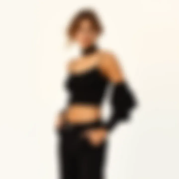 An elegant black top and pants ensemble showcased on a minimalist background.