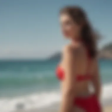 A serene ocean view complemented by the elegance of a model wearing a red halter swimsuit