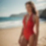 A vibrant red halter swimsuit displayed against a sunlit beach backdrop