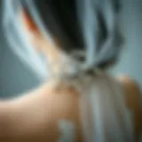 Elegant wedding veil clip adorned with intricate beadwork.